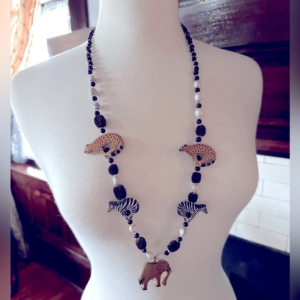 Long wooden necklace from S Africa. Zebra, elephant, cheetah handmade